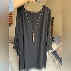Black dress with necklace